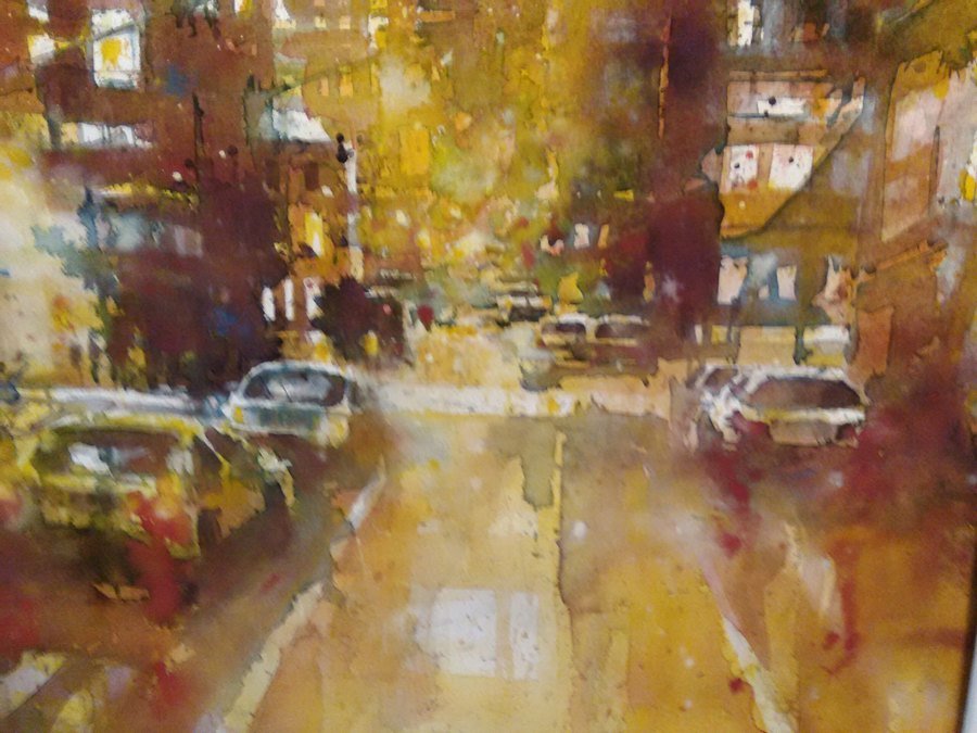 Aquarelle d'Éric Laurent : rue urbaine aux ocres et jaunes intenses
